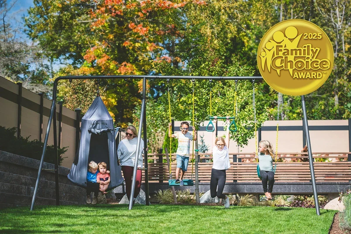 Five kids on a large metal swing with a woman supervising from behind. Family Choice Award badge is transposed on the image.