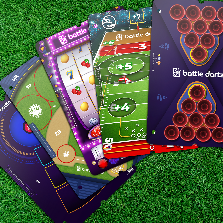Collection of colorful game cards with 'battle dartz' branding on a grass background